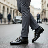 Schwarze Herren-Slipper aus Lack-PU