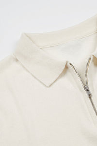 Herren-Poloshirt in Off-White, Strick, Kurzarm, mit Reißverschluss am Kragen, weichem Materialmix