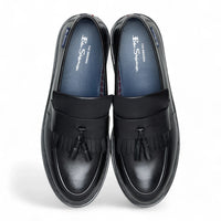 Schwarze Herren-Slipper aus Leder mit dicker Sohle und Quasten